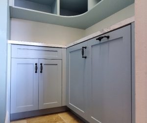 Baby blue shelves and cabinets
