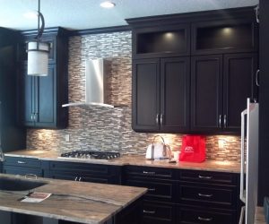 Dark stained wood cabinets and drawers