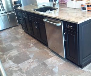 Dark stained wood cabinets and drawers