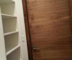 Walnut wood door with white shelves