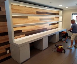 white shelving and desk area